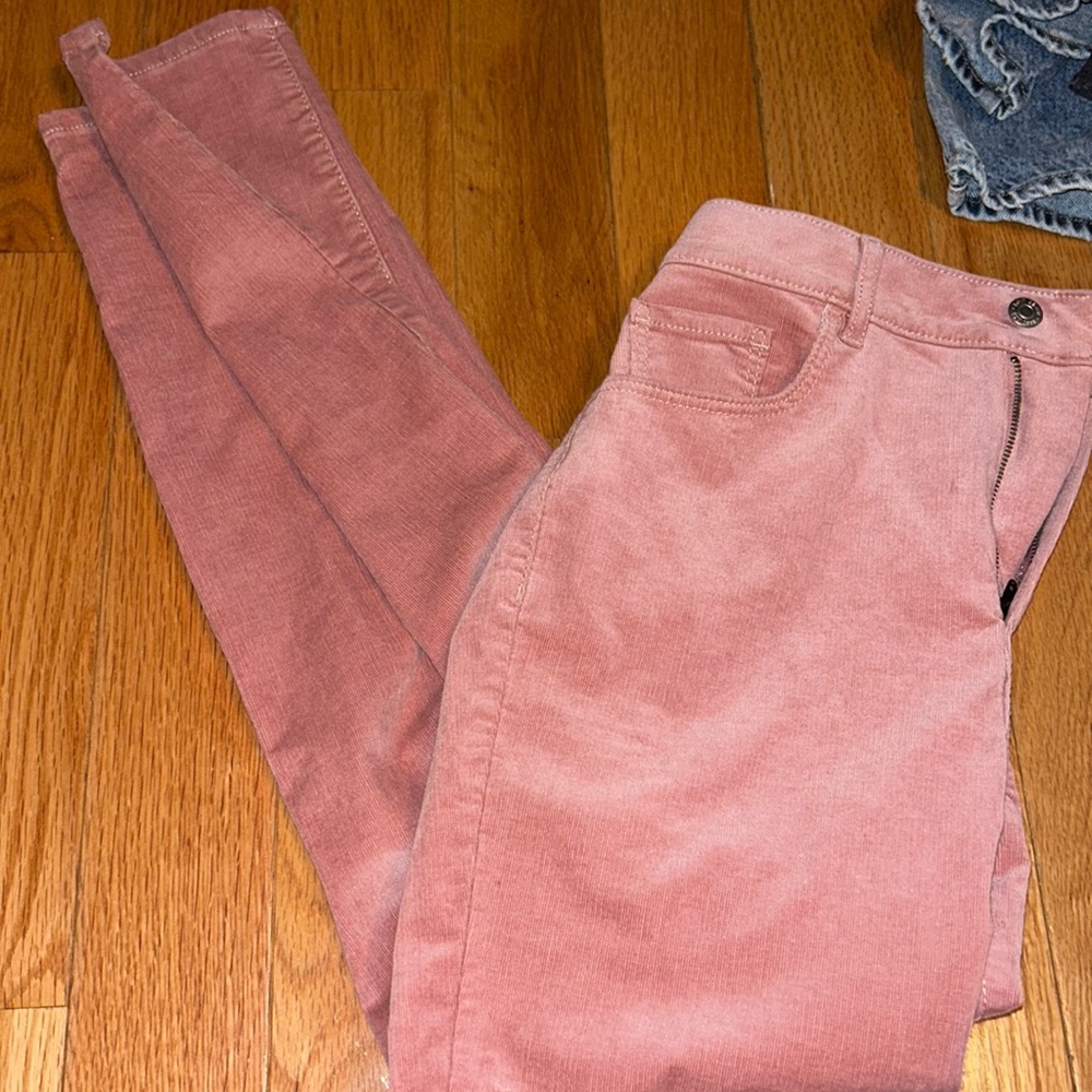 Pink loft jeans that are new; selling because of the color and to big